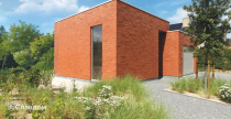 Частный дом в Синт-Идесбальд с облицовкой кирпичом Terca Marono Rood