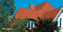 Жилой дом с бассейном с крышей из черепицы Creaton Biber Klassik Naturrot