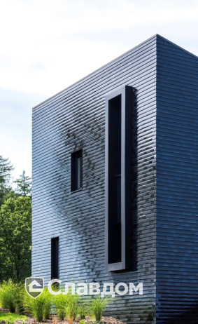 Жилой дом с применением керамической черепицы Koramic 301 Plain Tile Smooth Anthracite Engobe и Black Glazed