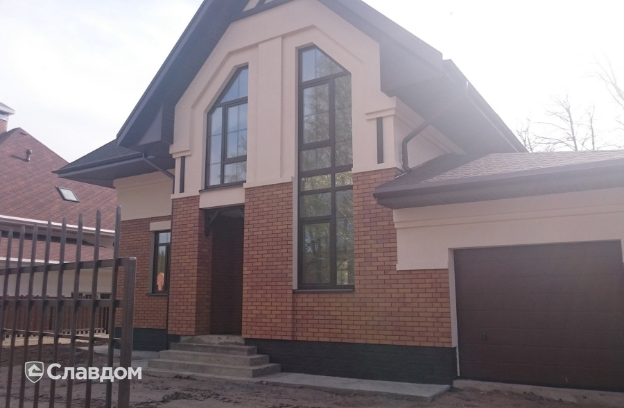 Частный дом с облицовкой фасадной плиткой Stroeher Keraprotect 405