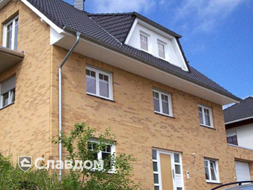 Частный дом с облицовкой кирпичом Roben Ravello gelb-bunt