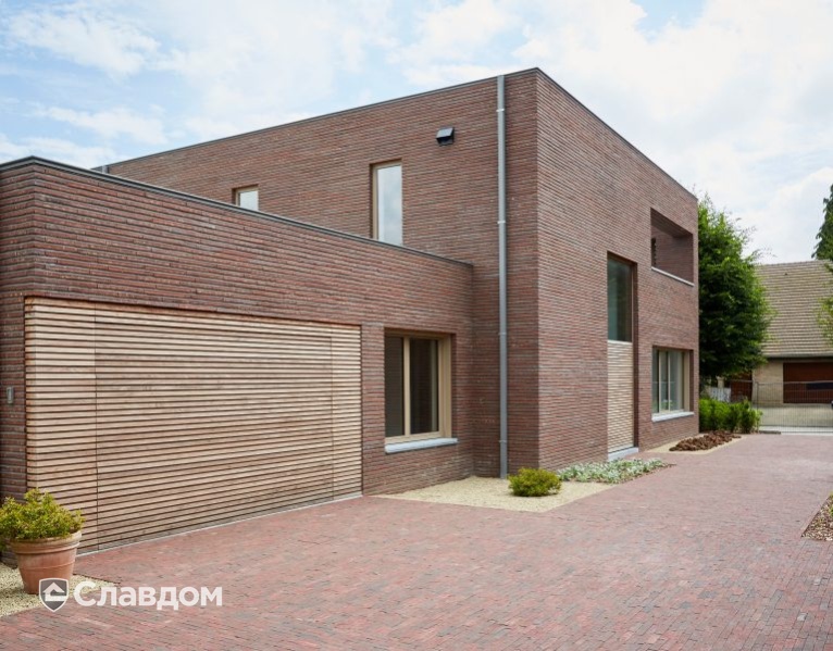 Частный дом в Дестелбергене с облицовкой кирпичом Terca Wasserstrich Special Rood