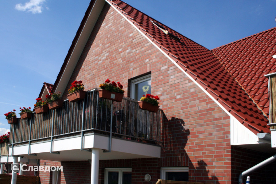 Частный дом с облицовкой кирпичом Roben Filsum