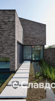 Частный дом в Хюльденберге с облицовкой кирпичом Terca Iluzo Grijs-zwart