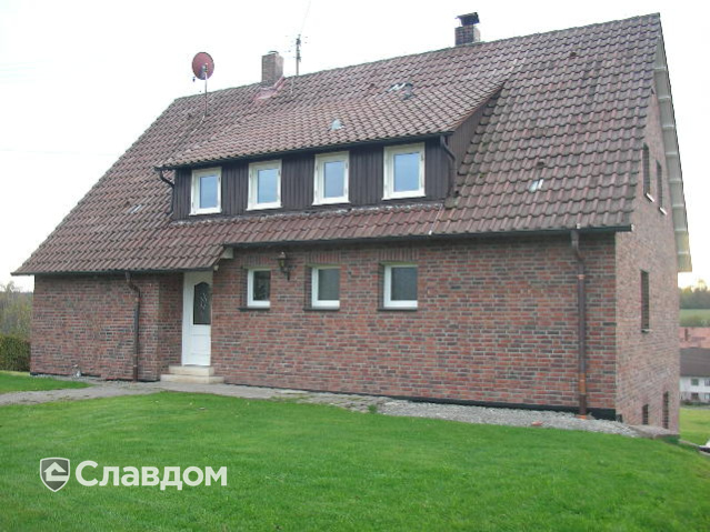 Двухэтажный коттедж с мансардой с облицовокой кирпичом Terca Milano