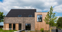 Частный дом в Лохристи с облицовкой кирпичом Terca Iluzo Grijs-zwart