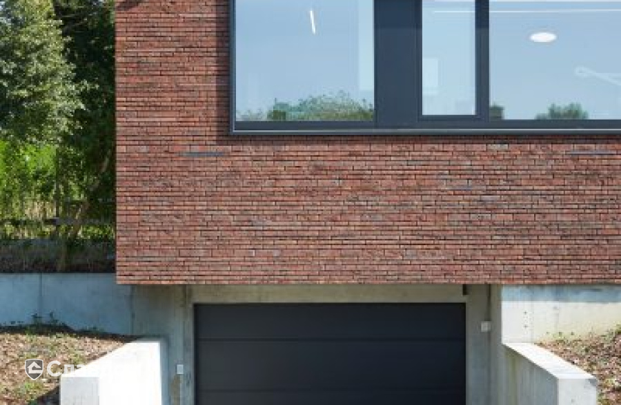 Стоматология в Кортрейке с облицовкой кирпичом Terca Wasserstrich Special E1 и Blauw-Rood Genuanceerd