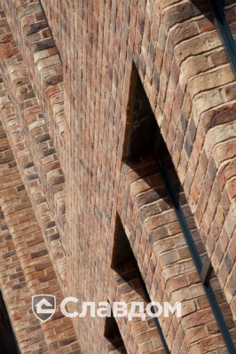 The Womens Organisation с облицовкой кирпичом Terca Topaas