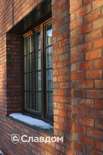 Коттедж с мансардой с облицовкой из кирпича Terca Kastanjebruin