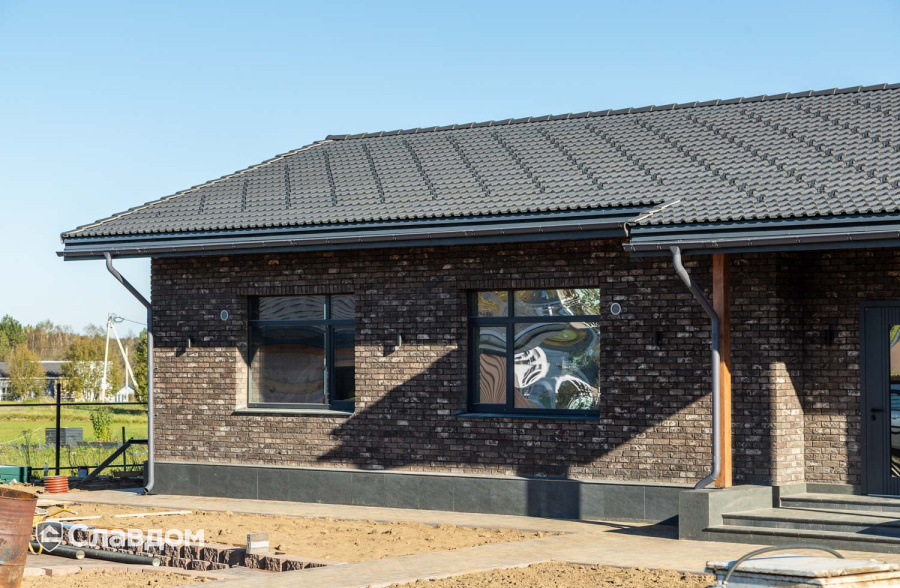 Частный дом с облицовкой из кирпича Тандем Данилово