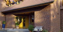 Коттедж с облицовкой кирпичом Feldhaus Klinker 335 carmesi antic mana
